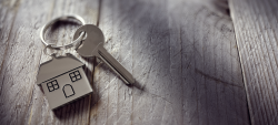 Photo of key with silver house key ring attached