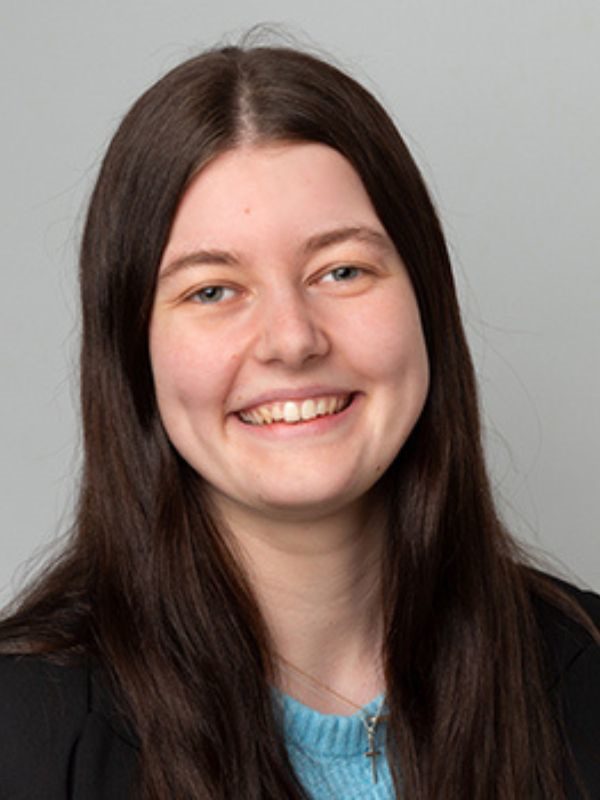 Professional headshot of a smiling young woman, representing a member of the Ellis-Fermor & Negus solicitors' team in the East Midlands.
