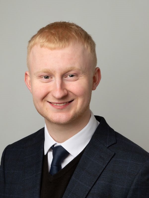 Headshot of a smiling young solicitor in a formal suit, representing Ellis-Fermor & Negus, East Midlands solicitors