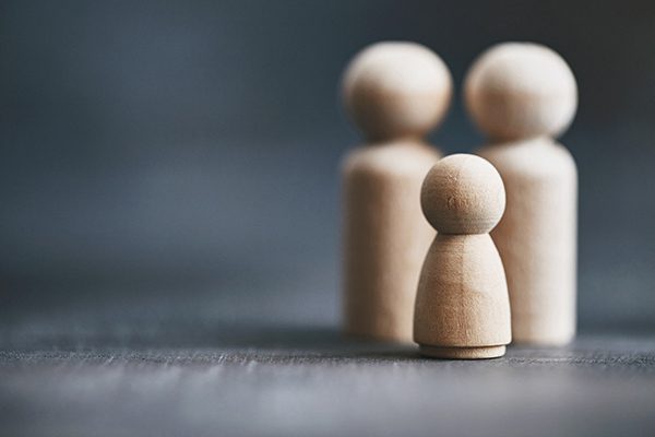 Three wooden figures symbolizing family law and legal representation by solicitors in the East Midlands